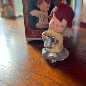 Daisy-Mary's Angels Hallmark Keepsake ornament. 1997. 10th in series.